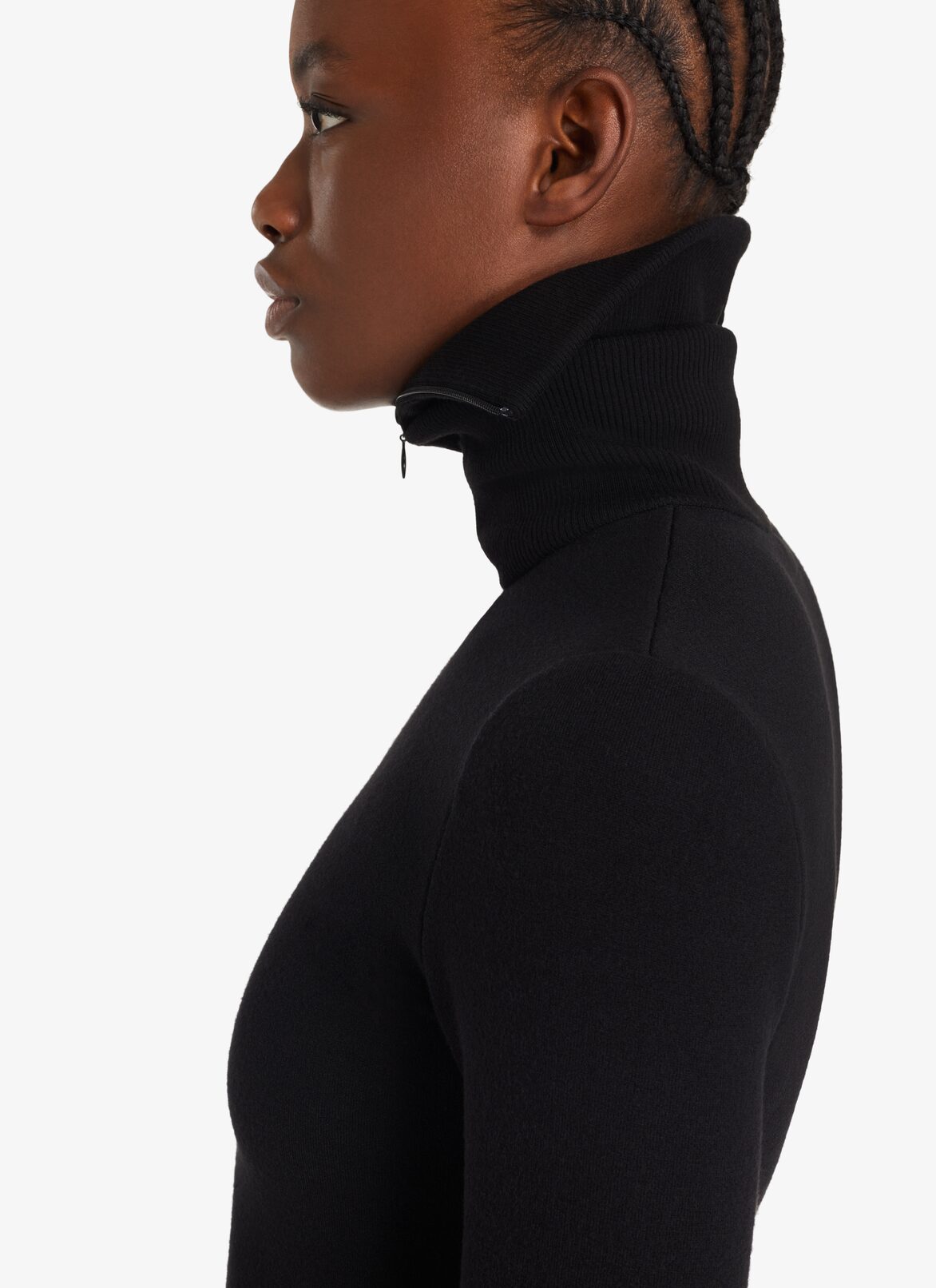 Minimalist turtleneck in wool ALAÏA BLACK MINIMALIST TURTLENECK IN WOOL